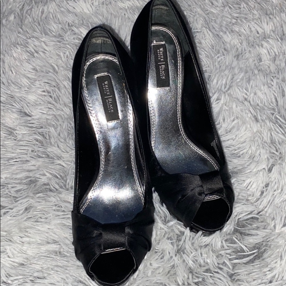 All black heels with bow and small opening